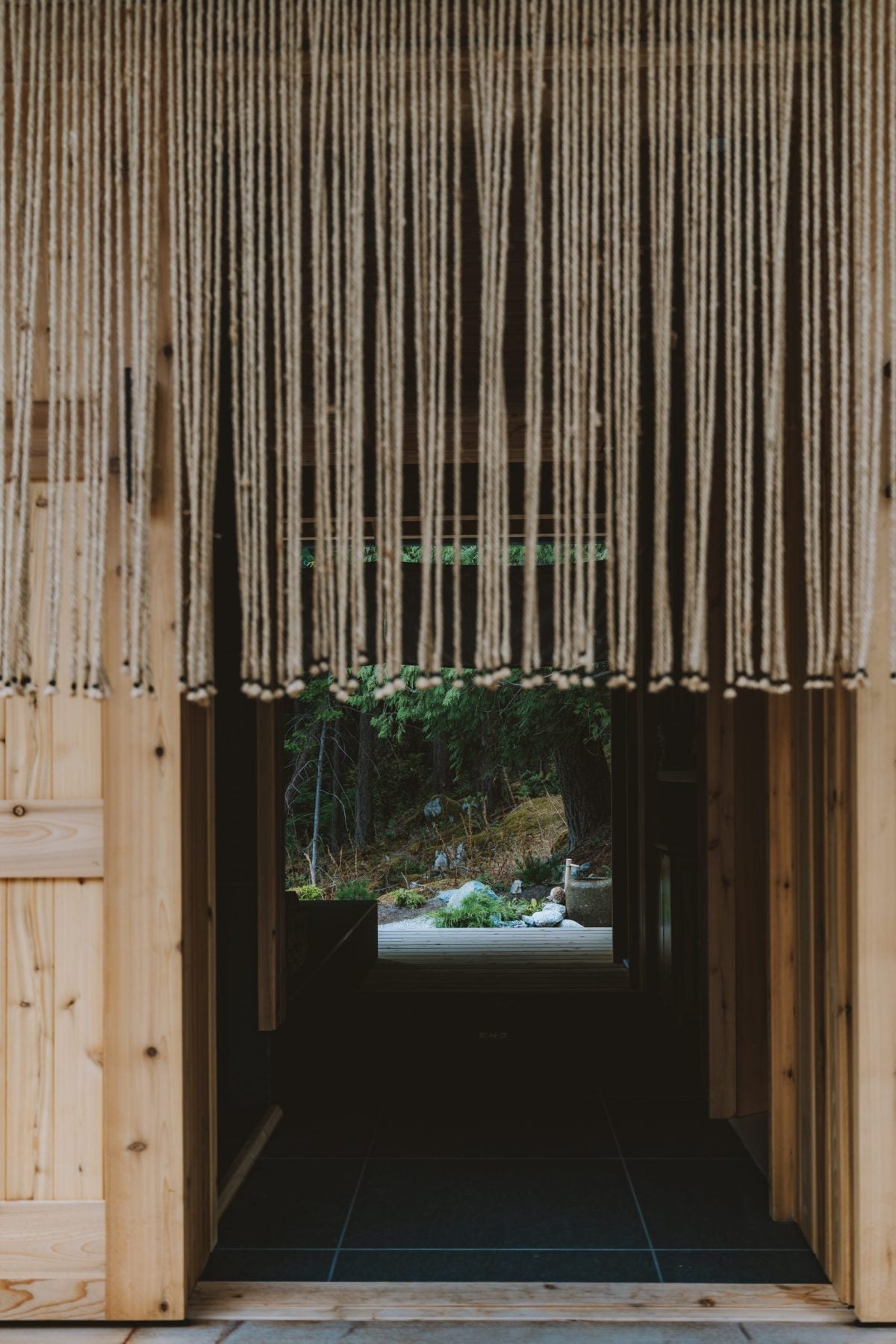 Outdoor Japanese-inspired bathhouse in the forest at Kitoki Inn